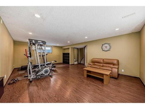 328 Eversyde Way Sw, Calgary, AB - Indoor Photo Showing Gym Room