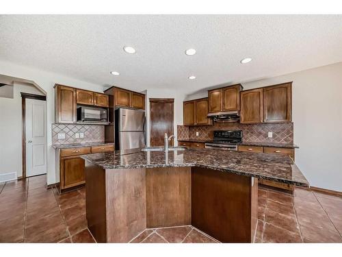328 Eversyde Way Sw, Calgary, AB - Indoor Photo Showing Kitchen