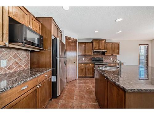 328 Eversyde Way Sw, Calgary, AB - Indoor Photo Showing Kitchen