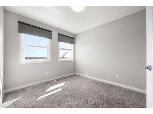 83 Evanscrest Terrace Nw, Calgary, AB - Indoor Photo Showing Other Room