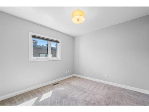 2-1818 Kensington Road Nw, Calgary, AB - Indoor Photo Showing Other Room