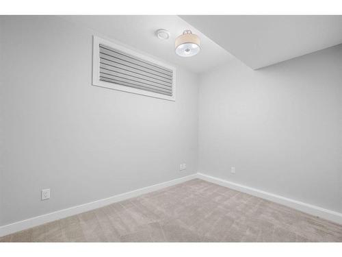 2-1818 Kensington Road Nw, Calgary, AB - Indoor Photo Showing Other Room