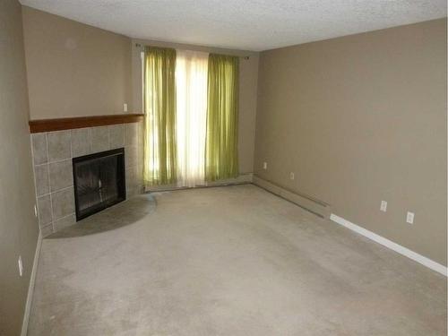 3113-13045 6 Street Sw, Calgary, AB - Indoor With Fireplace