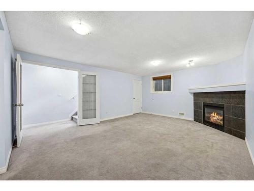 22 New Brighton Green Se, Calgary, AB - Indoor With Fireplace