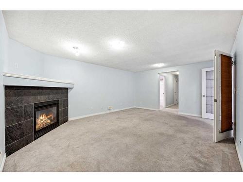 22 New Brighton Green Se, Calgary, AB - Indoor With Fireplace
