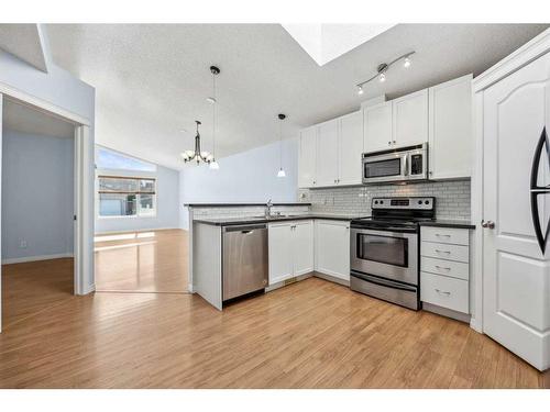 22 New Brighton Green Se, Calgary, AB - Indoor Photo Showing Kitchen With Upgraded Kitchen