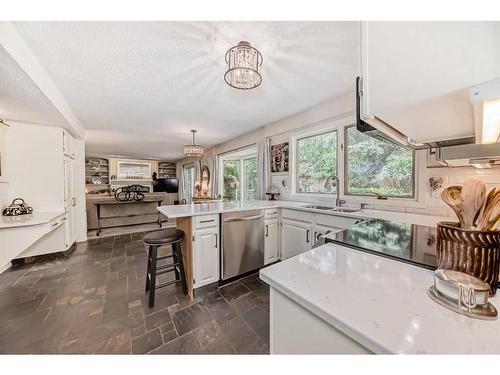 87 Woodglen Circle Sw, Calgary, AB - Indoor Photo Showing Kitchen With Double Sink