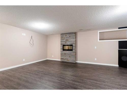 34 Cranarch Landing Se, Calgary, AB - Indoor With Fireplace