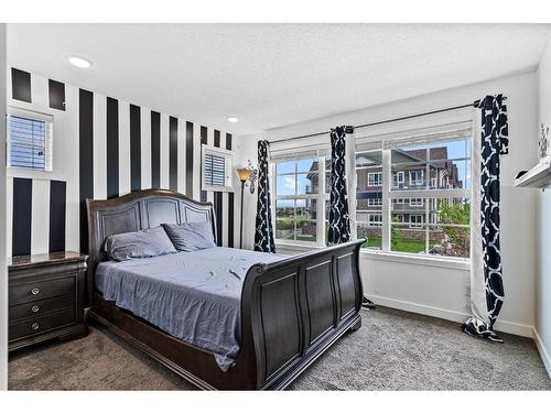 128 Silverado Boulevard Sw, Calgary, AB - Indoor Photo Showing Bedroom