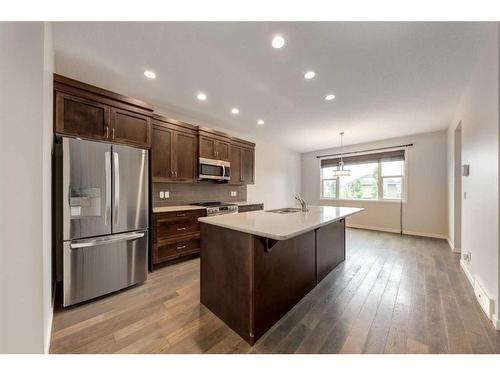 77 Cranford Place Se, Calgary, AB - Indoor Photo Showing Kitchen With Upgraded Kitchen