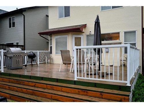 90 Cougarstone Close Sw, Calgary, AB - Outdoor With Deck Patio Veranda With Exterior