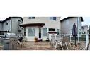 90 Cougarstone Close Sw, Calgary, AB  - Outdoor With Deck Patio Veranda With Exterior 