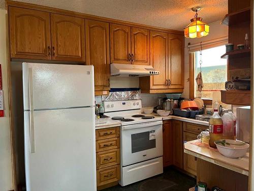 1304 Pennsburg Road Se, Calgary, AB - Indoor Photo Showing Kitchen