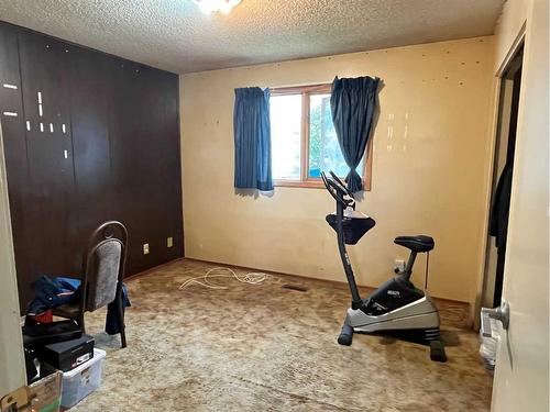 1304 Pennsburg Road Se, Calgary, AB - Indoor Photo Showing Gym Room