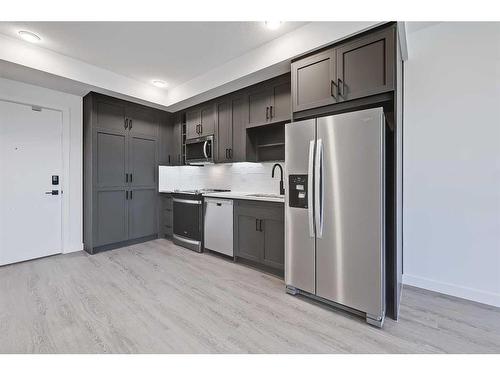 426-3932 University Avenue Nw, Calgary, AB - Indoor Photo Showing Kitchen With Stainless Steel Kitchen With Upgraded Kitchen