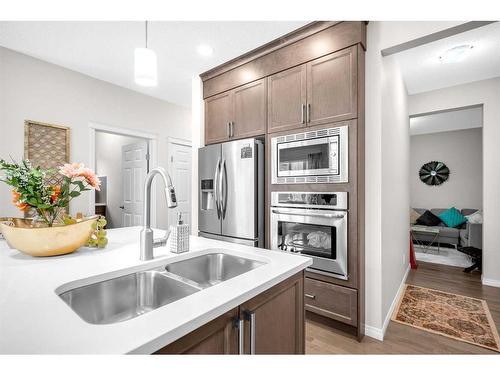 33 Savanna Common Ne, Calgary, AB - Indoor Photo Showing Kitchen With Double Sink