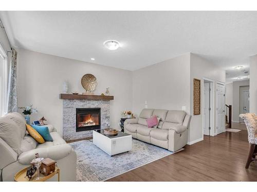 33 Savanna Common Ne, Calgary, AB - Indoor Photo Showing Living Room With Fireplace