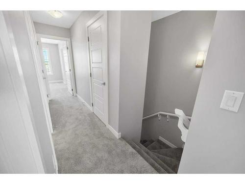 143 Amblefield Avenue Nw, Calgary, AB - Indoor Photo Showing Other Room