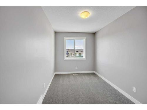 143 Amblefield Avenue Nw, Calgary, AB - Indoor Photo Showing Other Room