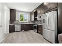 101-110 Redstone Ne, Calgary, AB  - Indoor Photo Showing Kitchen With Upgraded Kitchen 
