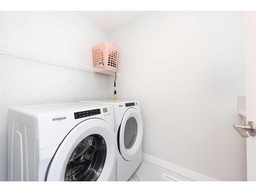 384 Legacy Reach Circle Se, Calgary, AB - Indoor Photo Showing Laundry Room