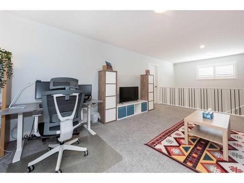 384 Legacy Reach Circle Se, Calgary, AB - Indoor Photo Showing Gym Room