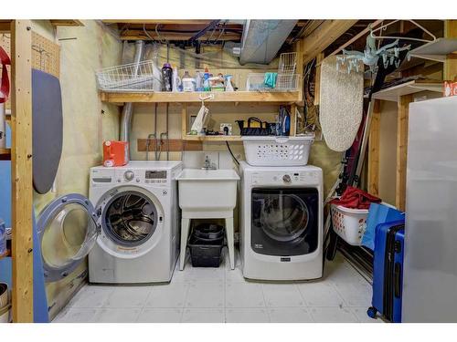 105 Arbour Wood Mews Nw, Calgary, AB - Indoor Photo Showing Laundry Room