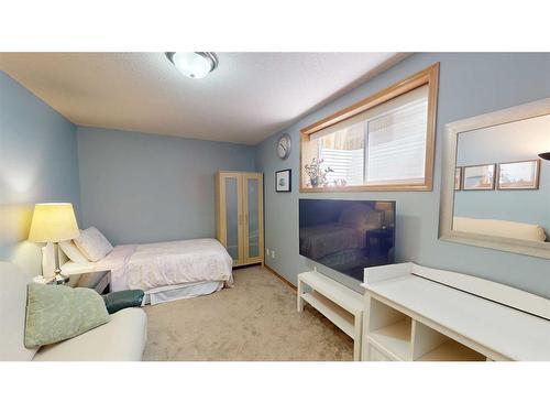 157 Chapalina Close Se, Calgary, AB - Indoor Photo Showing Bedroom