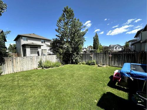 157 Chapalina Close Se, Calgary, AB - Outdoor With Backyard