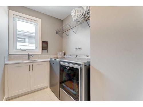 34 Yarrow Gate, Rural Rocky View County, AB - Indoor Photo Showing Laundry Room