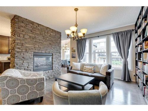 55 Mahogany Rise Se, Calgary, AB - Indoor Photo Showing Living Room With Fireplace