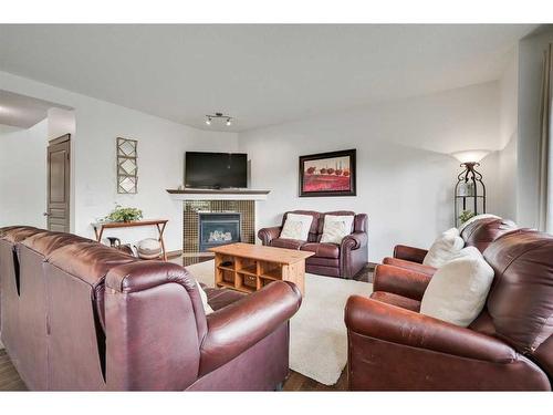 50 Royal Oak Drive Nw, Calgary, AB - Indoor Photo Showing Living Room With Fireplace
