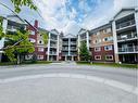 1101-10 Prestwick Bay Se, Calgary, AB  - Outdoor With Facade 