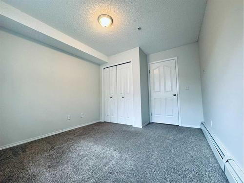 1101-10 Prestwick Bay Se, Calgary, AB - Indoor Photo Showing Other Room