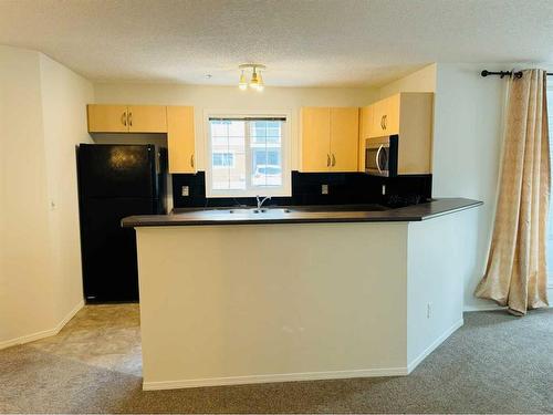 1101-10 Prestwick Bay Se, Calgary, AB - Indoor Photo Showing Kitchen