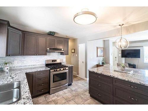 6220 Bowness Road Nw, Calgary, AB - Indoor Photo Showing Kitchen With Double Sink With Upgraded Kitchen