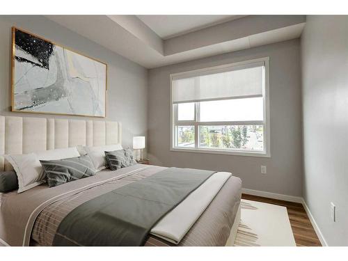 211-360 Harvest Hills Way Ne, Calgary, AB - Indoor Photo Showing Bedroom