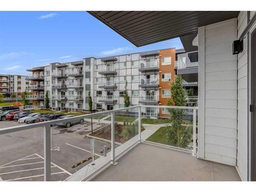 211-360 Harvest Hills Way Ne, Calgary, AB - Outdoor With Balcony With Exterior