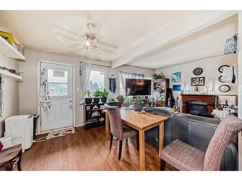 6425 35 Avenue Nw, Calgary, AB - Indoor Photo Showing Other Room With Fireplace