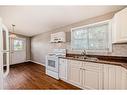 6425 35 Avenue Nw, Calgary, AB  - Indoor Photo Showing Kitchen With Double Sink 