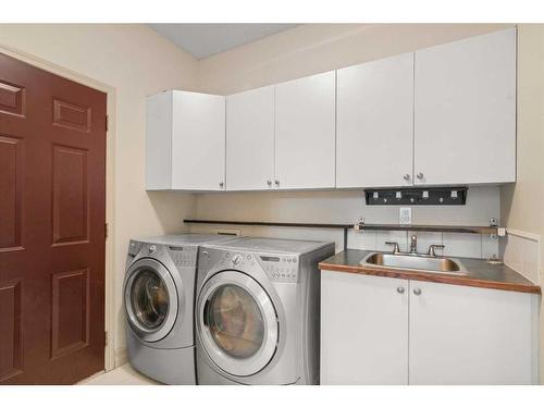 123 Hamptons Square Nw, Calgary, AB - Indoor Photo Showing Laundry Room