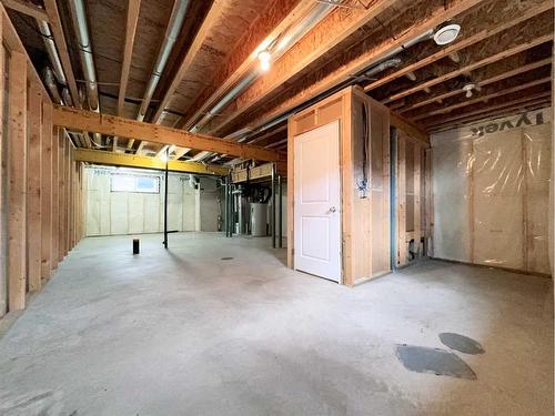 32 Carringvue Link Nw, Calgary, AB - Indoor Photo Showing Basement
