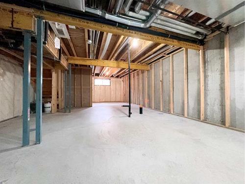 32 Carringvue Link Nw, Calgary, AB - Indoor Photo Showing Basement