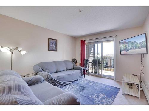 219-355 Taralake Way Ne, Calgary, AB - Indoor Photo Showing Living Room