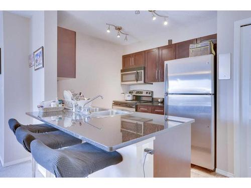 219-355 Taralake Way Ne, Calgary, AB - Indoor Photo Showing Kitchen With Stainless Steel Kitchen With Double Sink