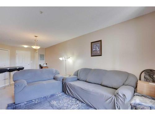 219-355 Taralake Way Ne, Calgary, AB - Indoor Photo Showing Living Room