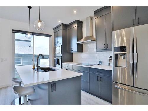 151 Rowley Gate Nw, Calgary, AB - Indoor Photo Showing Kitchen With Stainless Steel Kitchen With Upgraded Kitchen