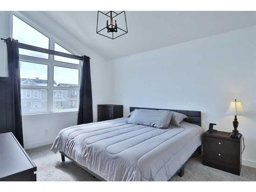 151 Rowley Gate Nw, Calgary, AB - Indoor Photo Showing Bedroom