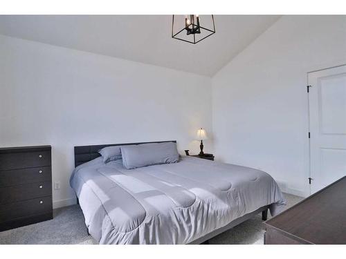 151 Rowley Gate Nw, Calgary, AB - Indoor Photo Showing Bedroom