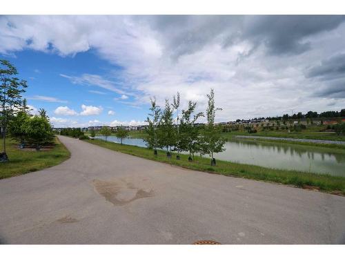 151 Rowley Gate Nw, Calgary, AB - Outdoor With Body Of Water With View